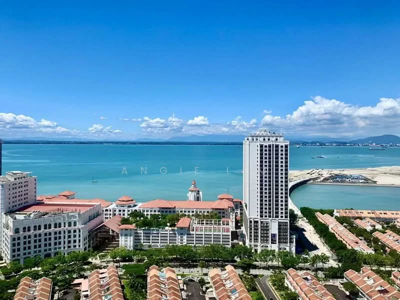 Exterior type: high-rise condominium; features: waterfront view, city skyline, surrounded by greenery, multiple-storey buildings, terracotta roof tiles, balconies on upper floors, manicured landscaping, adjacent to beach, modern architectural design, large windows, open space in foreground; style: modern.