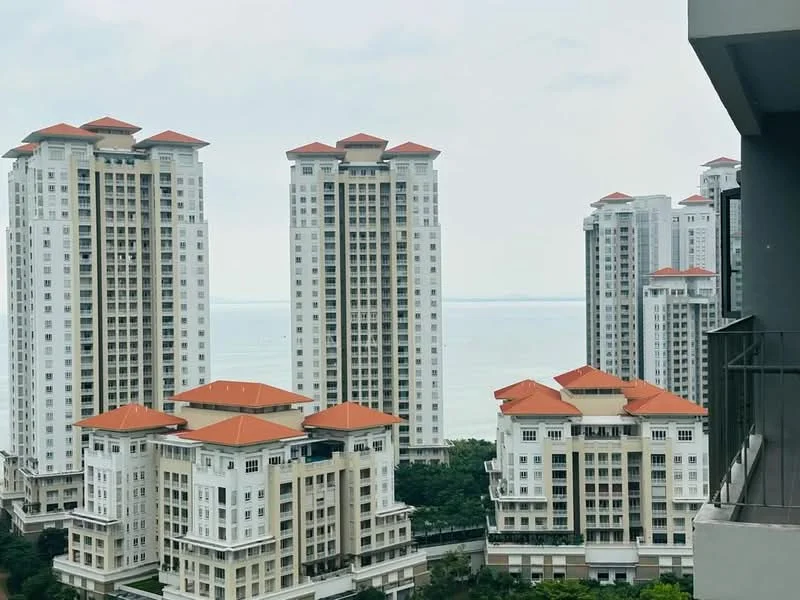 Exterior type: high-rise condominium; features: white painted facade, red tiled roofs, glass curtain wall, multiple towers, surrounded by greenery, sea view in background; style: modern.