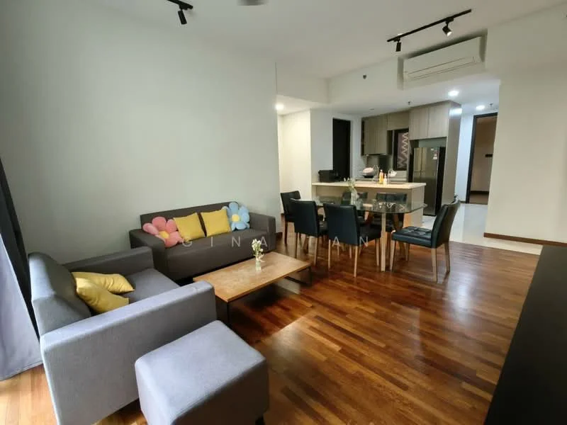 Living features: 3-seater fabric sofa in grey, 2-seater fabric sofa in dark grey, coffee table, wooden flooring, recessed downlights, floor-to-ceiling windows with sheer curtains, decorative cushions in blue and yellow, wall-mounted TV, open layout to kitchen, area rug, dining area visible in background; style: modern. Kitchen features: kitchen island with seating, stainless-steel fridge, built-in oven, 4-burner gas hob, cabinetry with wood finish, countertop with stone surface, pendant lighting above island; style: modern.