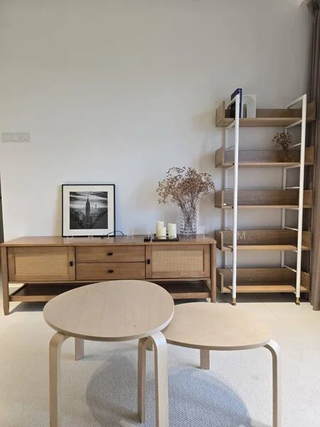 Living features: light wood console table, woven rattan drawer fronts, framed black and white artwork, decorative dried flowers in vase, light wood coffee table, two round coffee tables, open shelving unit in white, neutral wall color, carpeted flooring, curtains, ambient lighting; style: minimalist.