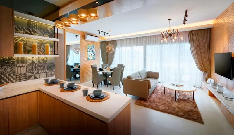 Living features: light wood cabinetry, white quartz countertop, 3-blade ceiling fan, chandelier with multiple bulbs, wall-mounted TV, sofa in light beige, coffee table with glass top, area rug with geometric pattern, floor-to-ceiling windows with sheer curtains, decorative wall art, recessed lighting, open-plan layout to dining area; style: modern; view: city. Dining features: 6-seater dining table, upholstered dining chairs, decorative wall art, pendant lighting above table; style: modern; view: city.