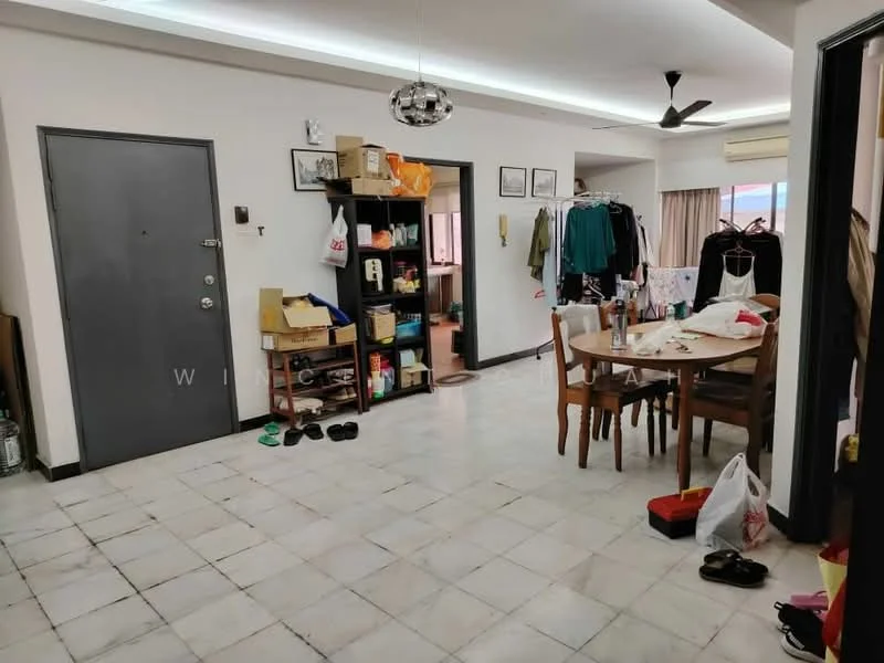 Living features: white walls, marble tile flooring, ceiling fan, dining table with chairs, open shelving unit, various household items on shelves, door to hallway, window with curtains, clothes hanging on rack, shoes on the floor, bags on the floor.