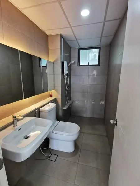 Bathroom features: white ceramic toilet, single-sink vanity with wall-mounted faucet, framed mirror above sink, shower with handheld showerhead, grey tiled walls, light grey floor tiles, window for natural light, wall-mounted shower heater; style: modern.