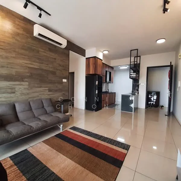 Living features: grey fabric sofa, area rug with geometric pattern, wall-mounted split AC, recessed downlights, wood accent wall, cream painted walls, glossy tile flooring, open layout to kitchen, black kitchen cabinetry, stainless-steel fridge, kitchen island with bar stools; style: modern.