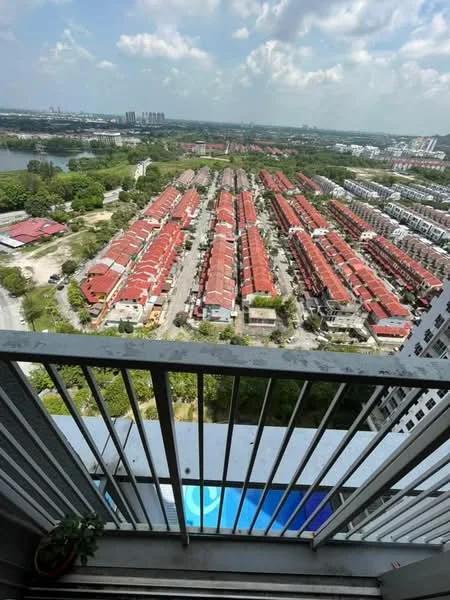 Room features: balcony with railing, view of residential area, view of swimming pool, city skyline in background, greenery visible, concrete flooring, planter with plant; style: modern; view: city.