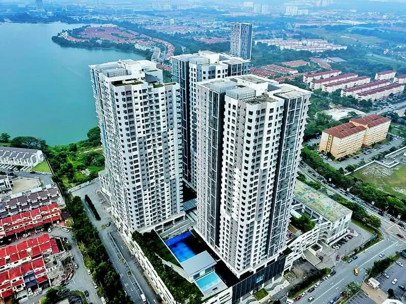 Exterior type: high-rise condominium; features: glass curtain wall, multiple towers, infinity pool, surrounded by water, landscaped garden, parking deck, urban skyline view, adjacent to residential area; style: modern.