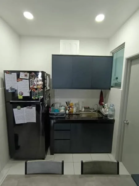 Kitchen features: black refrigerator, dark blue cabinetry, granite countertop, single-bowl stainless-steel sink, chrome pull-down faucet, white tiled backsplash, built-in oven, microwave, kitchen utensils on countertop, water dispenser, window above sink, light fixtures in ceiling, white painted walls, tile flooring; style: modern.