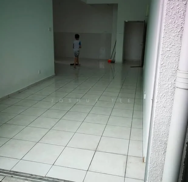 Room features: white painted walls, glossy ceramic tile flooring, open layout, natural light from entrance, no visible furniture, clean and uncluttered space, high ceiling, neutral color scheme; style: modern.