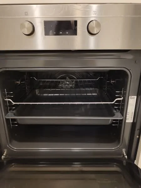 Room features: stainless-steel built-in oven, two oven racks, interior light, digital control panel, black interior, metal oven tray; style: modern.
