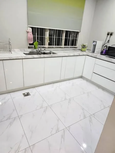 Kitchen features: white cabinetry, marble countertop, double-bowl stainless-steel sink, chrome pull-down faucet, white tiled backsplash, ceramic tile flooring, recessed downlights, window with grid pattern, dish rack, kitchen appliances, greenery in pots; style: modern.