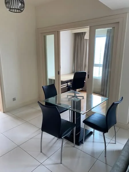 Dining features: glass dining table, 4 black dining chairs, white tiled flooring, neutral painted walls, large windows with sheer curtains, modern pendant light fixture, open layout to adjacent room, wooden desk visible in background; style: modern.