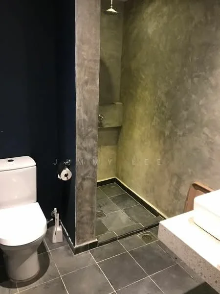 Bathroom features: one-piece toilet, walk-in shower with exposed shower head, grey concrete walls, dark grey tile flooring, stone countertop with sink, modern faucet, shower drainage, minimalist design; style: modern.