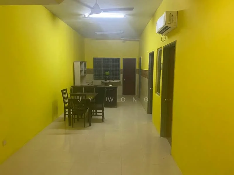 Room features: yellow painted walls, white tiled flooring, ceiling fan, wall-mounted split AC, dining table with four chairs, open layout, kitchen area visible in background, doorway leading to other rooms; style: modern.