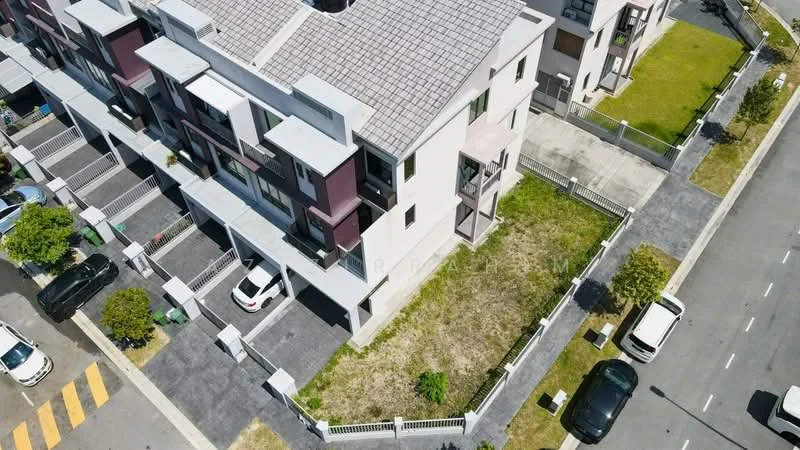 Exterior type: linked terrace house; features: flat roof, white painted facade, pink accent walls, manicured lawn, paved driveway, parking spaces, fenced yard, balconies on upper floors, surrounded by greenery, adjacent to road; style: modern.