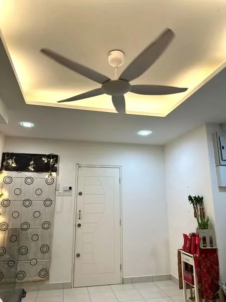 Room features: 5-blade ceiling fan with integrated LED light, recessed downlights, white painted walls, white tiled flooring, decorative wall with circular pattern, main entrance door, small dining table, indoor plants; style: modern.