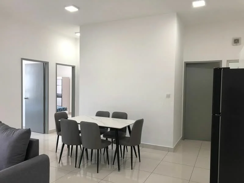 Dining features: white marble dining table, 6 grey upholstered dining chairs, white painted walls, tile flooring, recessed LED downlights, doorway leading to hallway, doorway leading to another room, black refrigerator visible in background; style: modern. Room features: white painted walls, tile flooring, doorway leading to hallway, doorway leading to another room.