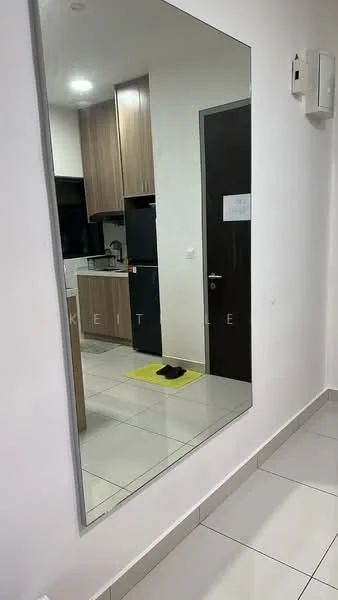 Room features: large mirror, white walls, tile flooring, kitchen cabinetry in wood finish, black refrigerator, kitchen countertop, door to another room, yellow mat, light fixture, open kitchen layout; style: modern.