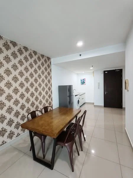 Dining features: wooden dining table with black metal legs, 4 wooden dining chairs, cream tiled flooring, decorative wallpaper with floral pattern, refrigerator, washing machine, wall-mounted artwork, recessed ceiling lights, white painted walls, door leading to hallway; style: modern.