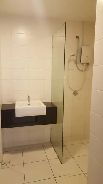 Bathroom features: white tiled walls, white floor tiles, glass shower enclosure, wall-mounted showerhead, single-bowl sink, black countertop, chrome faucet, built-in water heater; style: modern.