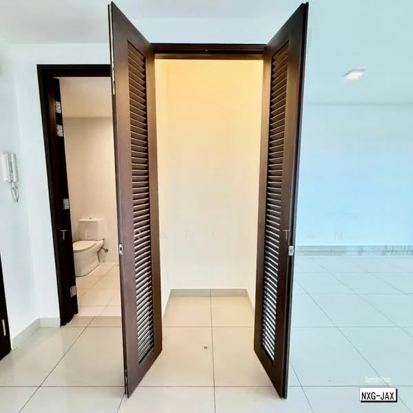 Room features: double wooden doors with louvered design, white painted walls, white tiled flooring, visible bathroom in background, light ceiling, no visible windows, neutral color scheme; style: modern.