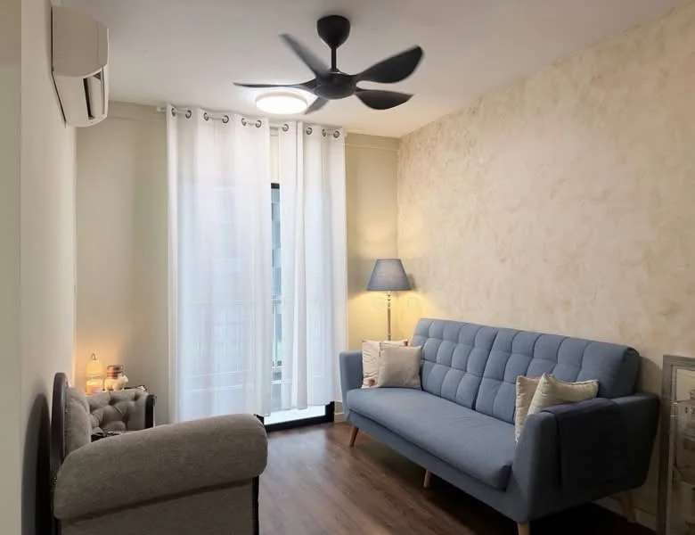 Living features: 3-seater fabric sofa in blue, 2-seater fabric sofa in grey, wooden flooring, white sheer curtains, ceiling fan with 3 blades, wall-mounted split AC, table lamp with blue shade, decorative cushions, textured wall finish, glass sliding door; style: modern.