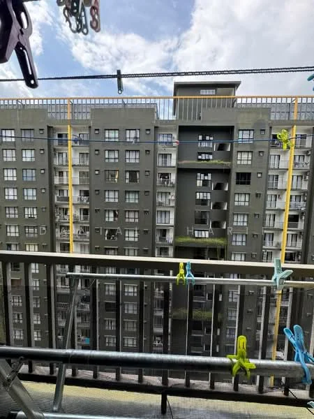 Room features: balcony with railing, clothes drying rack, view of adjacent building, grey painted walls, concrete flooring, overhead clothesline, city skyline in background; style: modern; view: city.