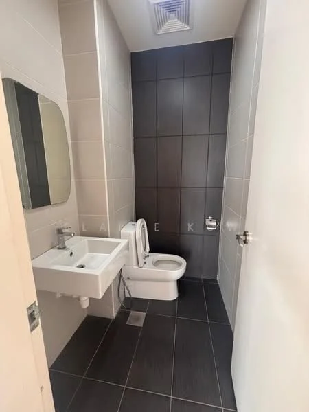 Bathroom features: single-sink vanity with wall-mounted faucet, framed mirror, one-piece toilet, walk-in shower with glass enclosure, tile cladding on walls, dark tile flooring, white painted walls, exhaust fan; style: modern.