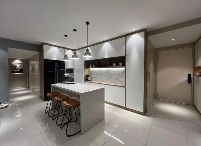Kitchen features: white marble countertop, white cabinetry with flat-panel design, black refrigerator, built-in oven, microwave, 3 pendant lights, bar stools, ceramic tile flooring, recessed downlights, open shelving, decorative plants on shelves, grey accent wall; style: modern.