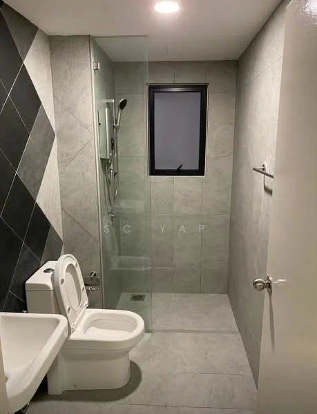 Bathroom features: grey tile flooring, grey wall tiles with diagonal pattern, glass shower enclosure, rain shower head, handheld shower, one-piece toilet, single-sink vanity with white cabinet, mirror above vanity, window for natural light, recessed ceiling lights; style: modern.