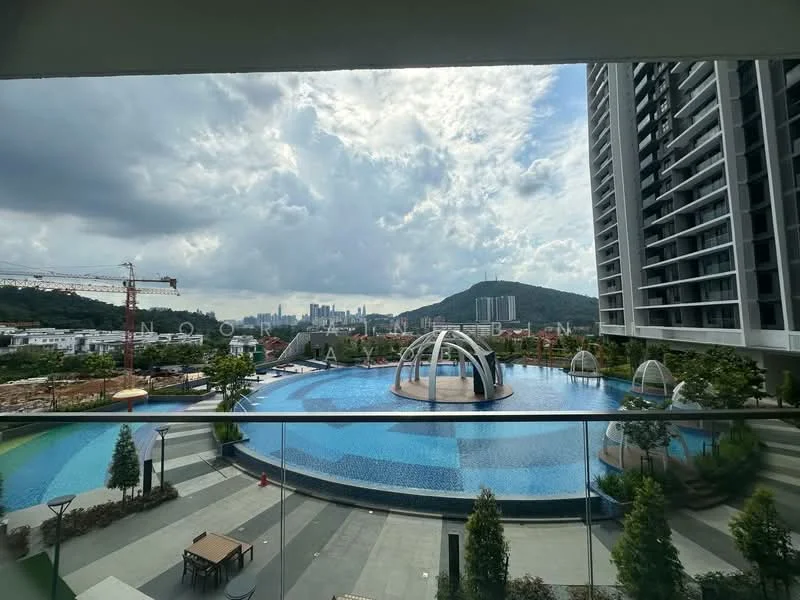 Exterior type: high-rise condominium; features: infinity pool, pool deck with loungers, landscaped garden, water feature, surrounded by greenery, city skyline view, mountain view, modern architecture, balconies on upper floors, construction cranes visible in the background; style: modern.