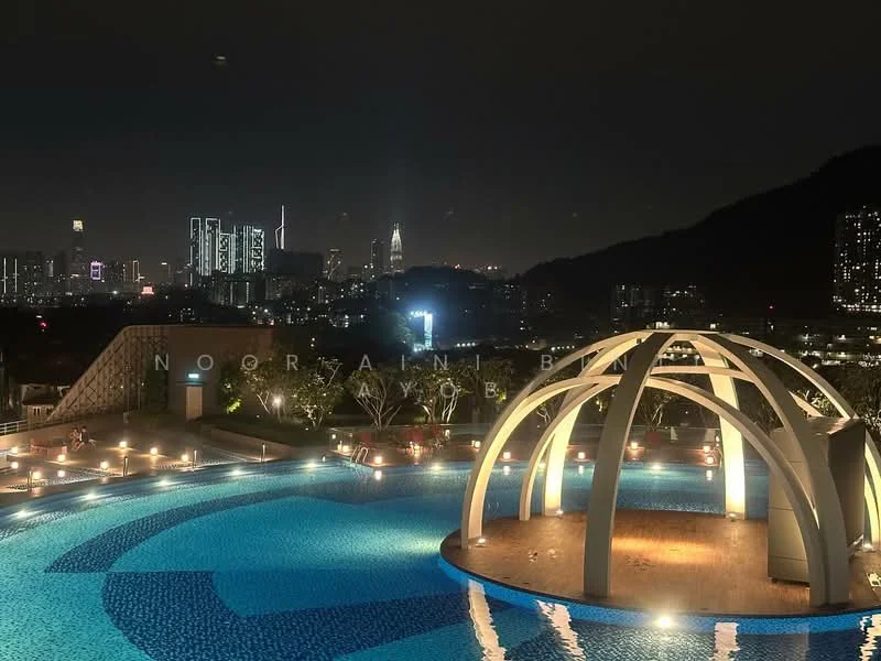 Exterior type: swimming pool deck; features: infinity pool, pool deck with loungers, architectural gazebo structure, city skyline view, night lighting, surrounding landscaping; style: modern.