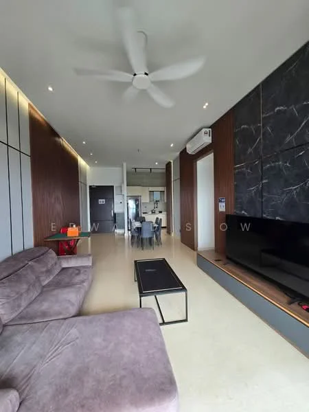 Living features: 3-seater fabric sofa in grey, coffee table, wall-mounted TV, entertainment unit, ceiling fan, recessed downlights, wood paneling, marble accent wall, open layout, large windows, dining area visible in background; style: modern. Kitchen features: open kitchen layout, kitchen island, stainless-steel appliances, cabinets with wood finish; style: modern.
