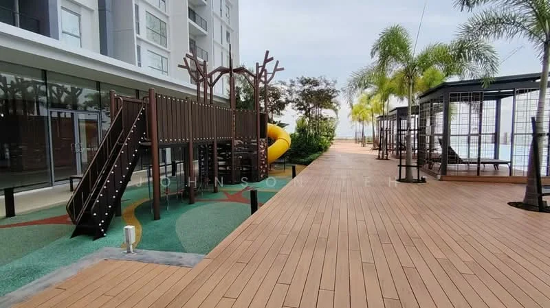 Exterior type: landscape garden; features: children's playground with slide and climbing structure, wooden decking pathway, tropical landscaping with palm trees, seating areas with canopies, manicured lawn, playground surface with rubber flooring; style: modern.