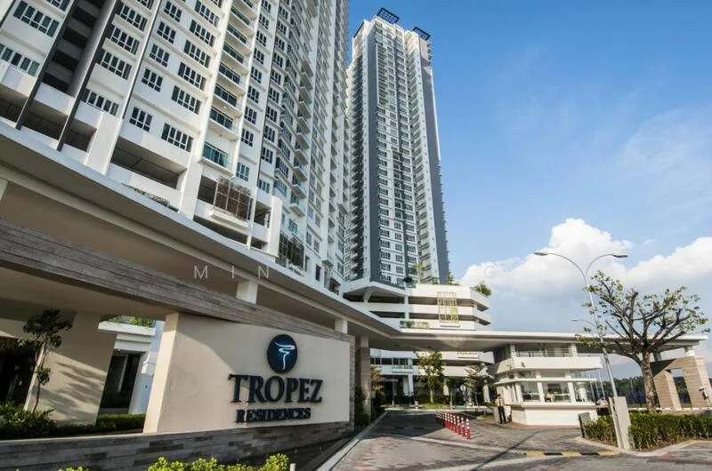 Exterior type: high-rise condominium; features: glass curtain wall, white painted facade, recessed balconies, landscaped entrance, manicured lawn, mature trees, driveway with interlocking pavers, covered parking, double-volume main lobby, security guard house at entrance; style: modern.