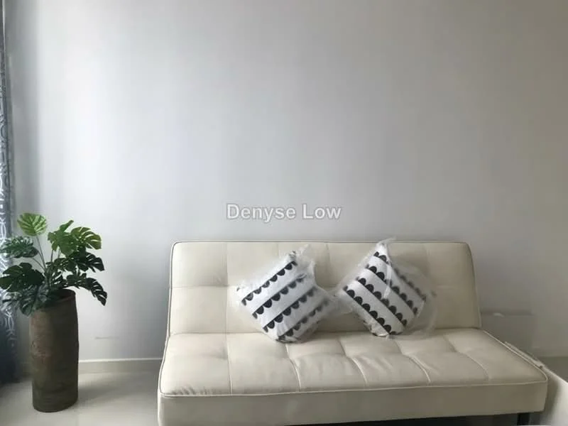 Living features: white painted walls, light-colored flooring, sofa in cream color, two decorative cushions with black pattern, potted plant, floor vase, curtains with blue pattern, natural light from window; style: modern.