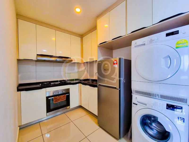 Kitchen features: white high-gloss cabinetry, black granite countertop, built-in gas stove, built-in oven, stainless-steel fridge, front-load washing machine, tumble dryer, ceramic tile flooring, recessed downlights; style: modern.