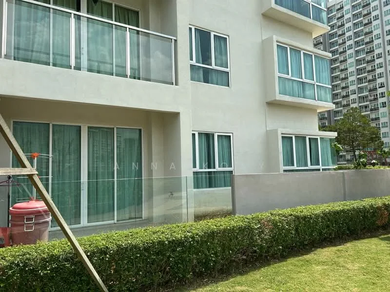 Exterior type: low-rise apartment block; features: white painted facade, glass balcony railings, green tinted windows, manicured lawn, hedge landscaping, surrounding greenery, multiple storeys, modern architectural design; style: modern.
