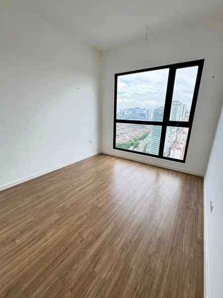 Room features: white painted walls, wooden flooring, large floor-to-ceiling window, city skyline view; view: city.