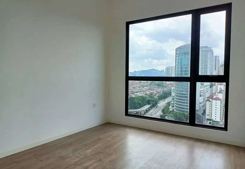 Room features: large floor-to-ceiling window, city view, light wood flooring, plain white walls, no visible furniture; style: modern; view: city.