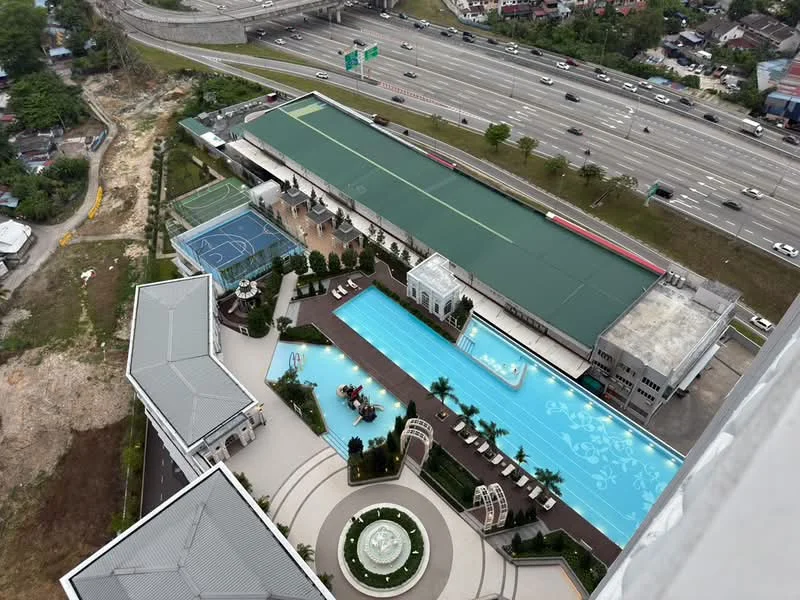 Exterior type: high-rise condominium; features: infinity pool with poolside loungers, children's playground, tennis court, landscape garden with manicured lawns, outdoor dining pavilion, BBQ pit, water feature, surrounded by mature greenery, multi-storey car park, access to main road; style: modern.