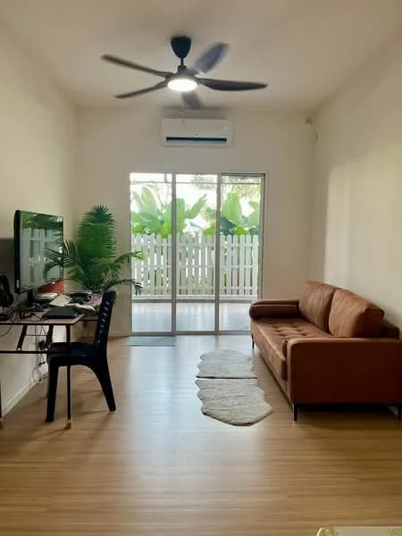 Living features: brown leather sofa, wall-mounted TV, black office chair, wooden flooring, 5-blade ceiling fan, wall-mounted split AC, sliding glass door, sheer curtains, decorative indoor plant, area rug; style: modern; view: garden.