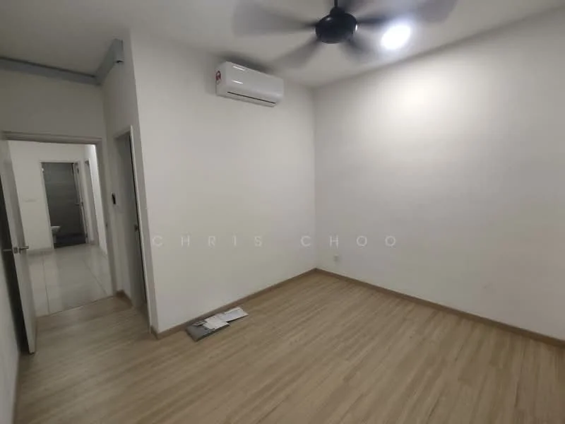 Room features: light wood flooring, white painted walls, ceiling fan, wall-mounted split AC, doorway leading to another room, doorway leading to bathroom, no visible furniture.
