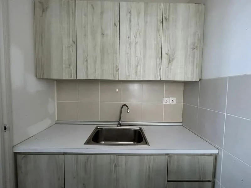 Kitchen features: single-bowl stainless-steel sink, chrome pull-down faucet, light wood cabinetry, white countertop, white tiled backsplash, cream tiled walls, grey tiled flooring, two electrical outlets; style: modern.