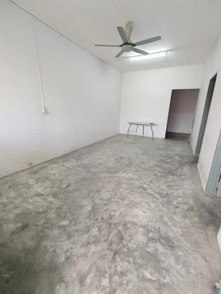 Room features: grey polished concrete flooring, white painted walls, ceiling fan, single light fixture, doorway leading to another room; style: minimalist.