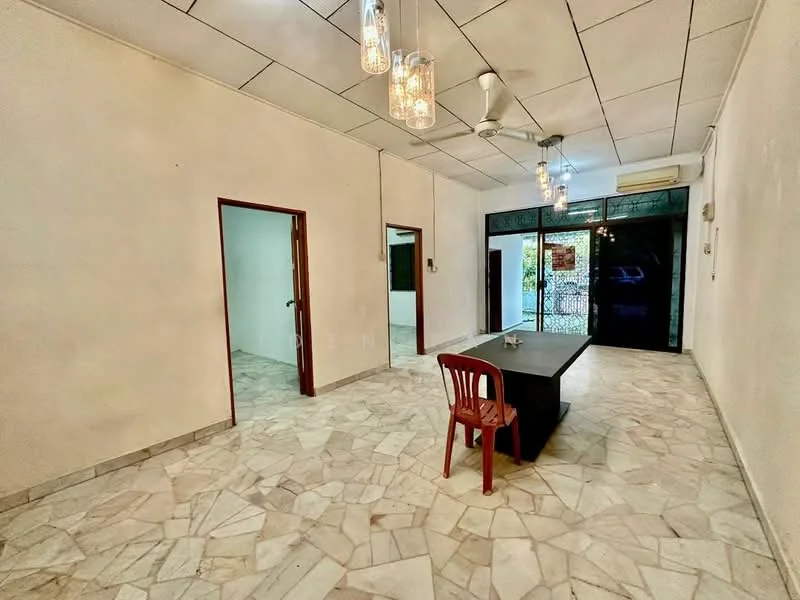 Room features: white painted walls, marble flooring, dropped ceiling, recessed downlights, 2-blade ceiling fan, large glass sliding door, single wooden door, red plastic chair, black table, air conditioning unit; style: modern; view: garden.