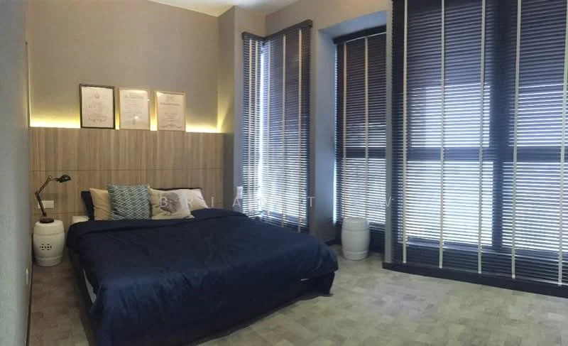 Bedroom features: king-size bed with navy blue bedding, wooden accent wall behind bed, two bedside tables, decorative pillows, floor-to-ceiling windows, blackout blinds, laminate flooring, framed artwork on wall, ambient LED lighting, white ceramic stool; style: modern.
