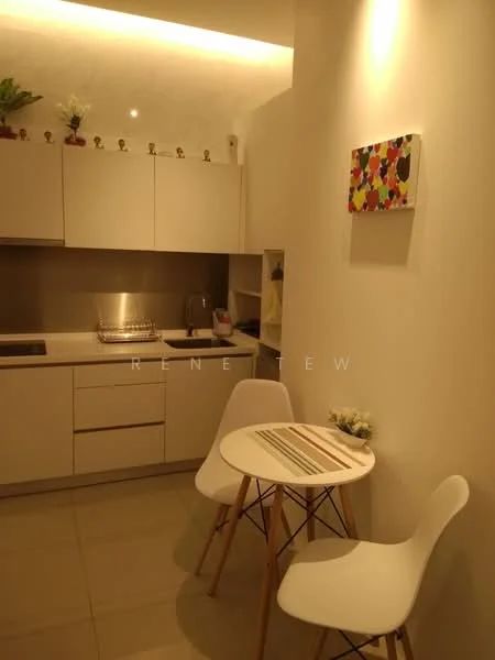 Kitchen features: white cabinetry, grey countertop, stainless-steel sink, chrome faucet, built-in stove, dish rack, small dining table, two white chairs, decorative wall art, potted plants on shelves, recessed lighting, tile flooring; style: modern.