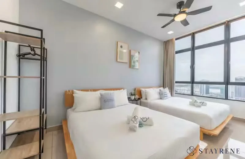 Bedroom features: two queen-size beds with wooden frames, light grey painted walls, floor-to-ceiling windows with city view, wooden flooring, 5-blade ceiling fan with light, decorative wall art, black metal clothing rack, bedside table with decorative items, sheer curtains, area rug; style: modern; view: city.