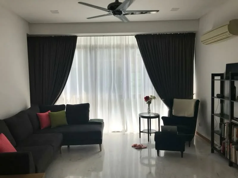 Living features: 3-seater fabric sofa in dark grey, 2-seater armchair in dark green, pink and green accent cushions, round side table, floor-to-ceiling windows, sheer white curtains, dark curtains, ceiling fan, wall-mounted split AC, polished marble flooring, bookshelf, decorative flowers in vase; style: modern.