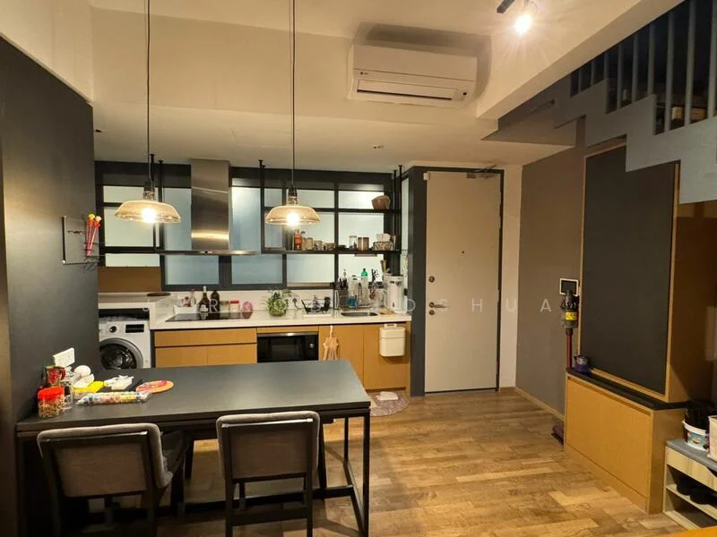 Kitchen features: white cabinetry, black countertops, stainless-steel sink, chrome pull-down faucet, built-in oven, freestanding washing machine, 4-burner gas hob, refrigerator, pendant lighting, wooden flooring, air conditioning unit, open shelving, wall-mounted cabinets, dining table with two chairs; style: modern.